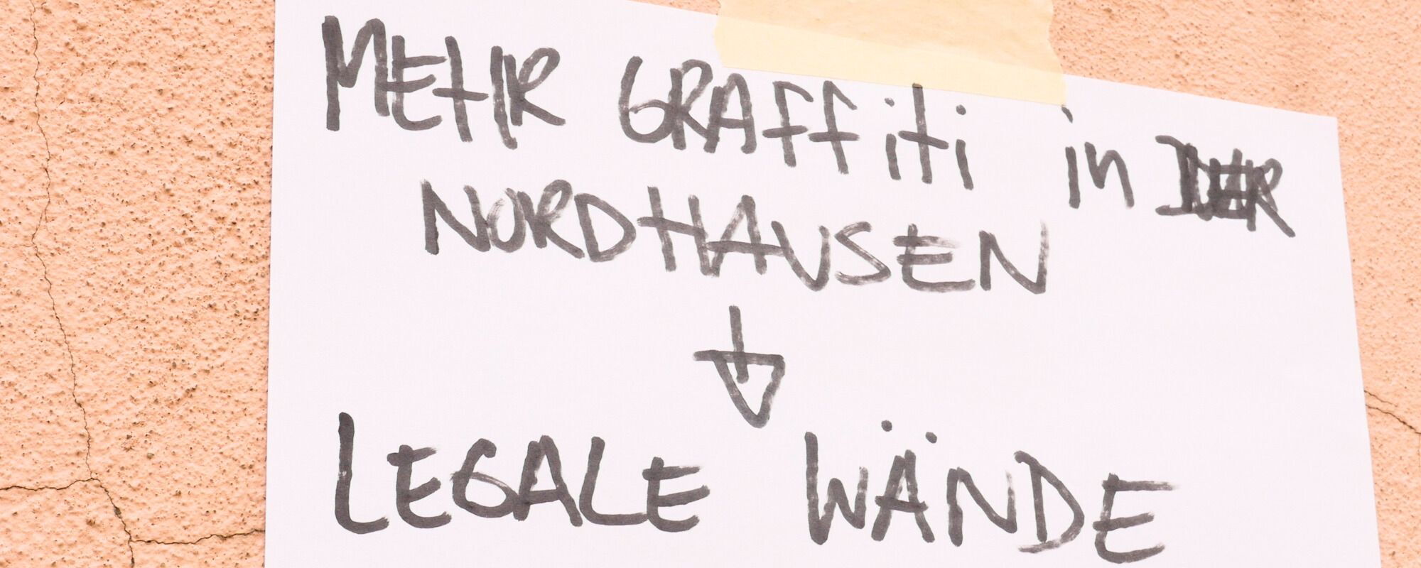 Poster with the inscription “More graffiti in Nordhausen - legal walls”