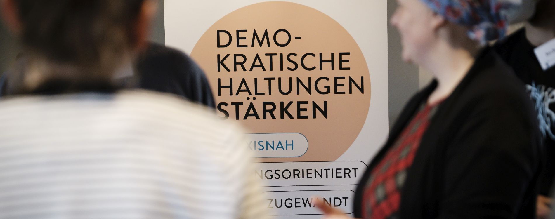 Roll-up with the inscription “Strengthening democratic attitudes”