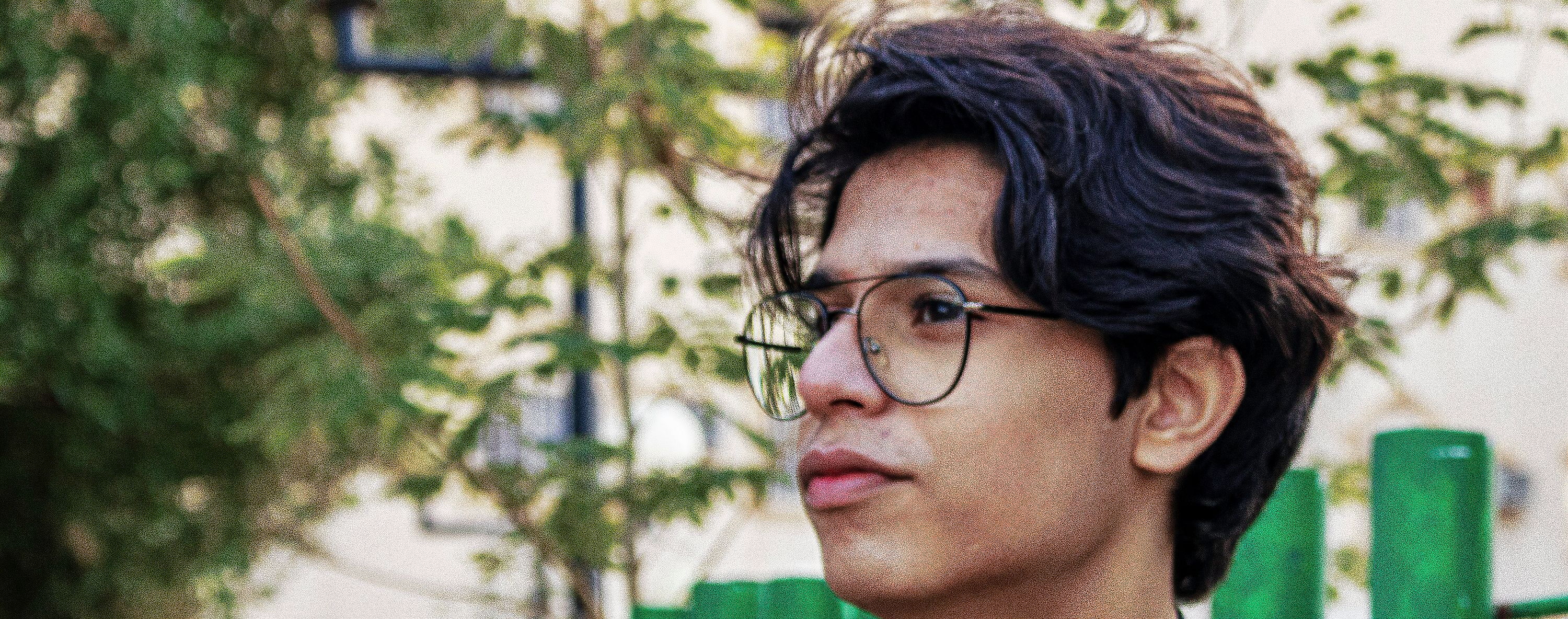 Young person with glasses