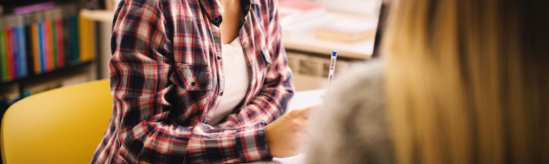 One person consulting another